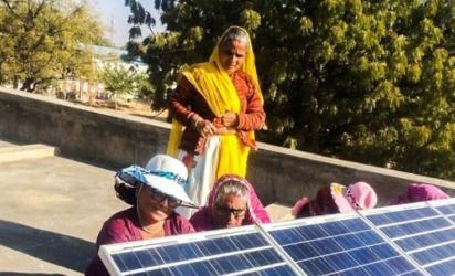 Women  with solar panels