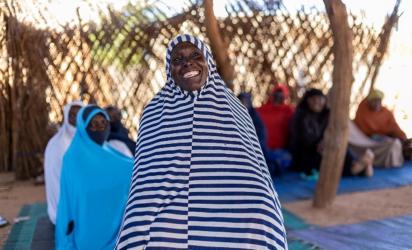 Fati Amadou after their weekly meeting with others women group members.