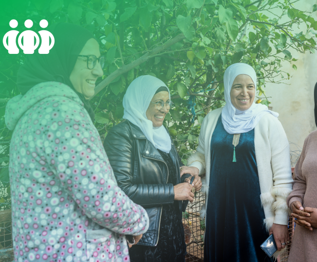 Outcome 3: Improving women's voice and agency. A group of four women having a conversation. 